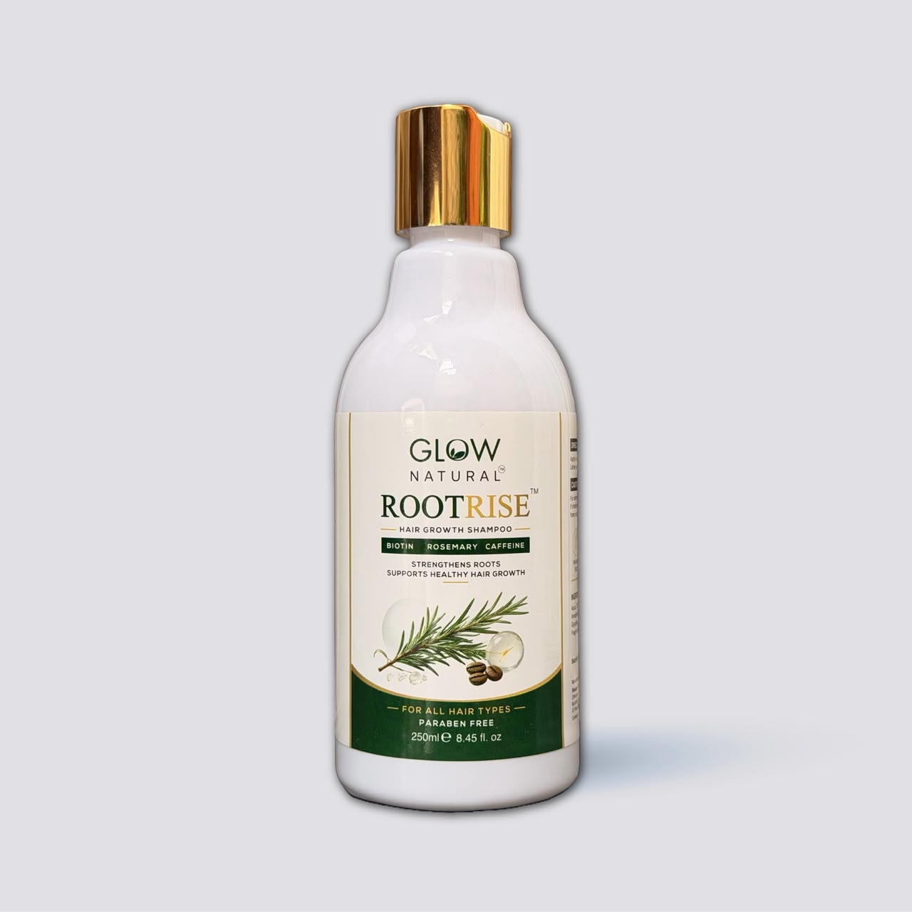 A white bottle of Glow Natural Rootrise Hair Growth Support serum with a metallic gold cap, shown on a light gray background.